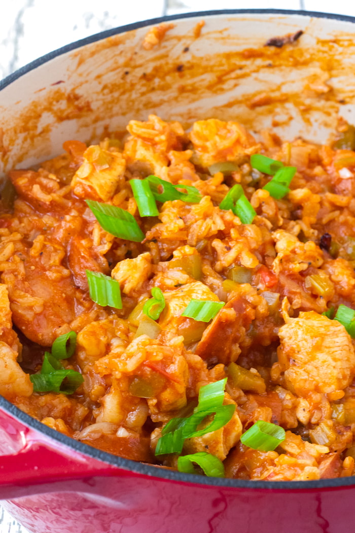 one pot chicken jambalaya on red dutch oven