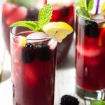 blackberry iced tea with mint and lemon slices