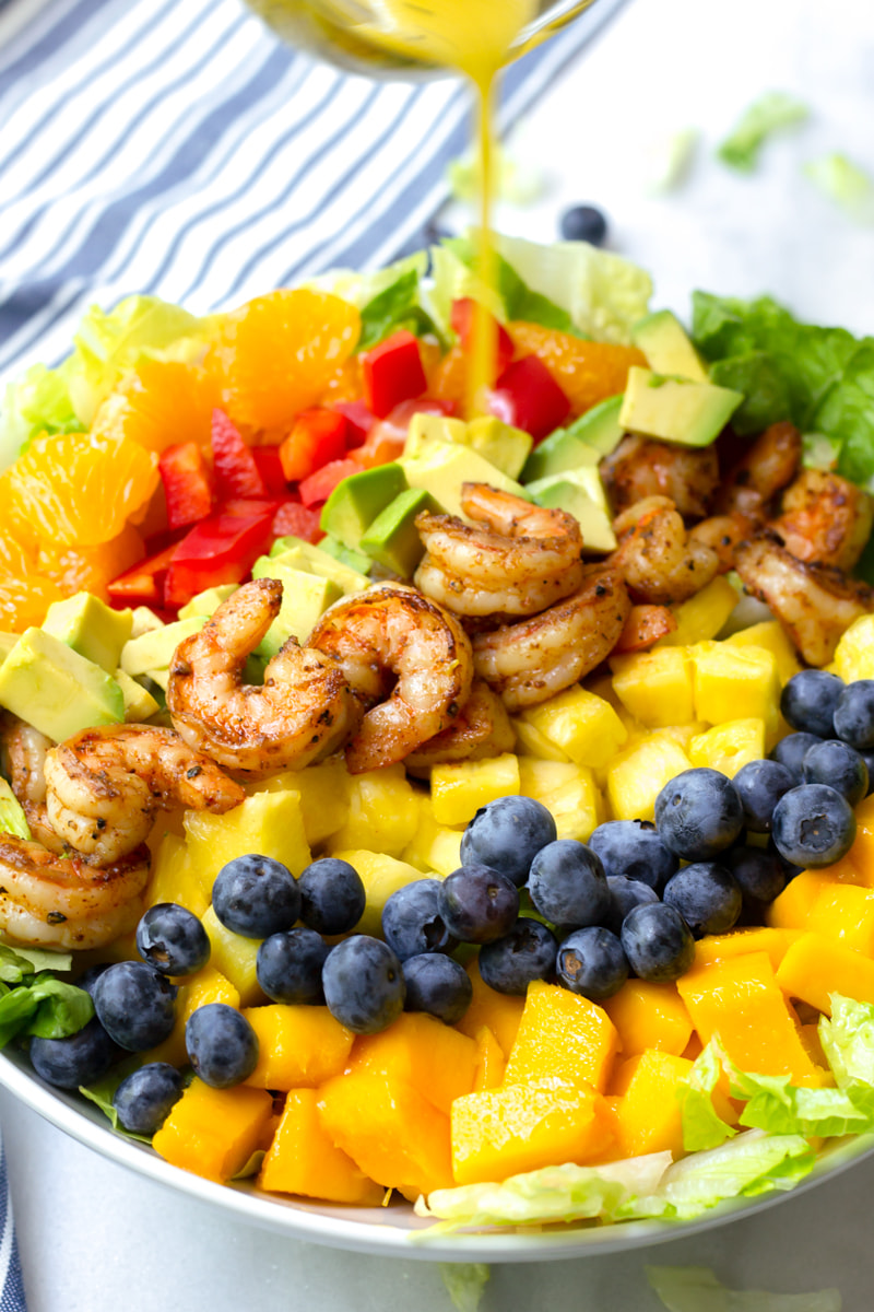 tropical shrimp salad drizzled with orange poppy seed dressing