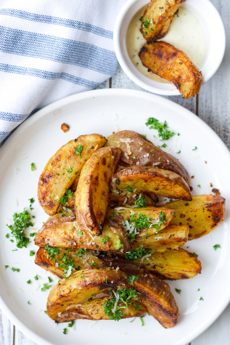 plate with roasted potato wedges