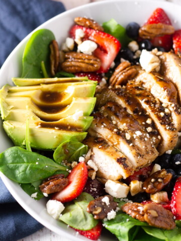 strawberry and spinach salad with chicken and maple balsamic dressing