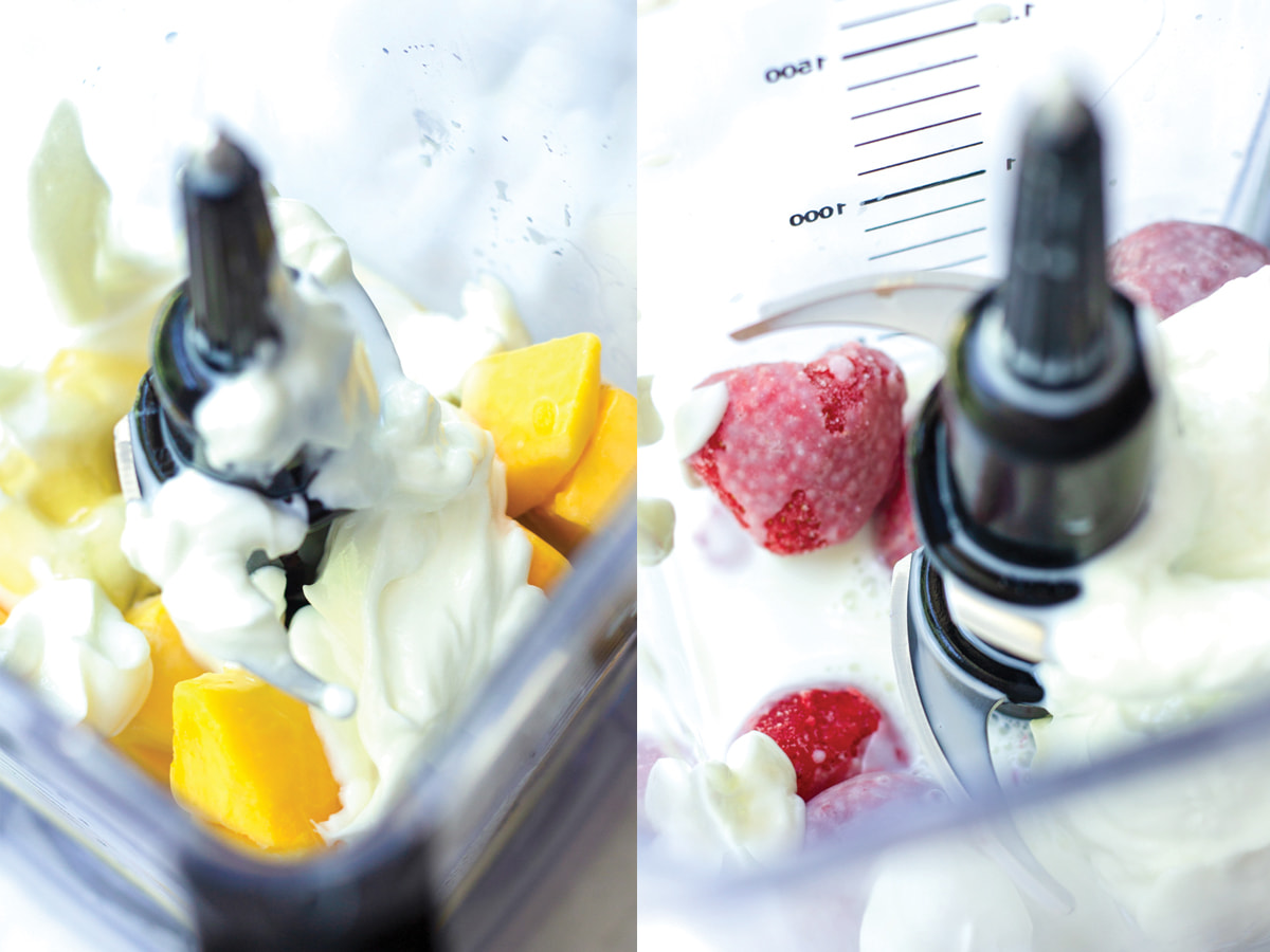 mangoes and strawberries in blender with yogurt