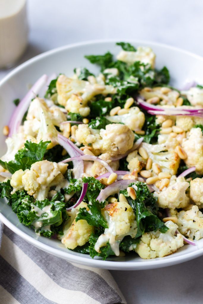 Roasted Cauliflower and Kale Salad with Lemon Tahini Dressing Cooking