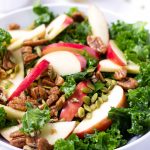 kale and apple salad with pecans and pumpkin seeds