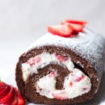 chocolate cake roll with cream cheese and strawberry filling