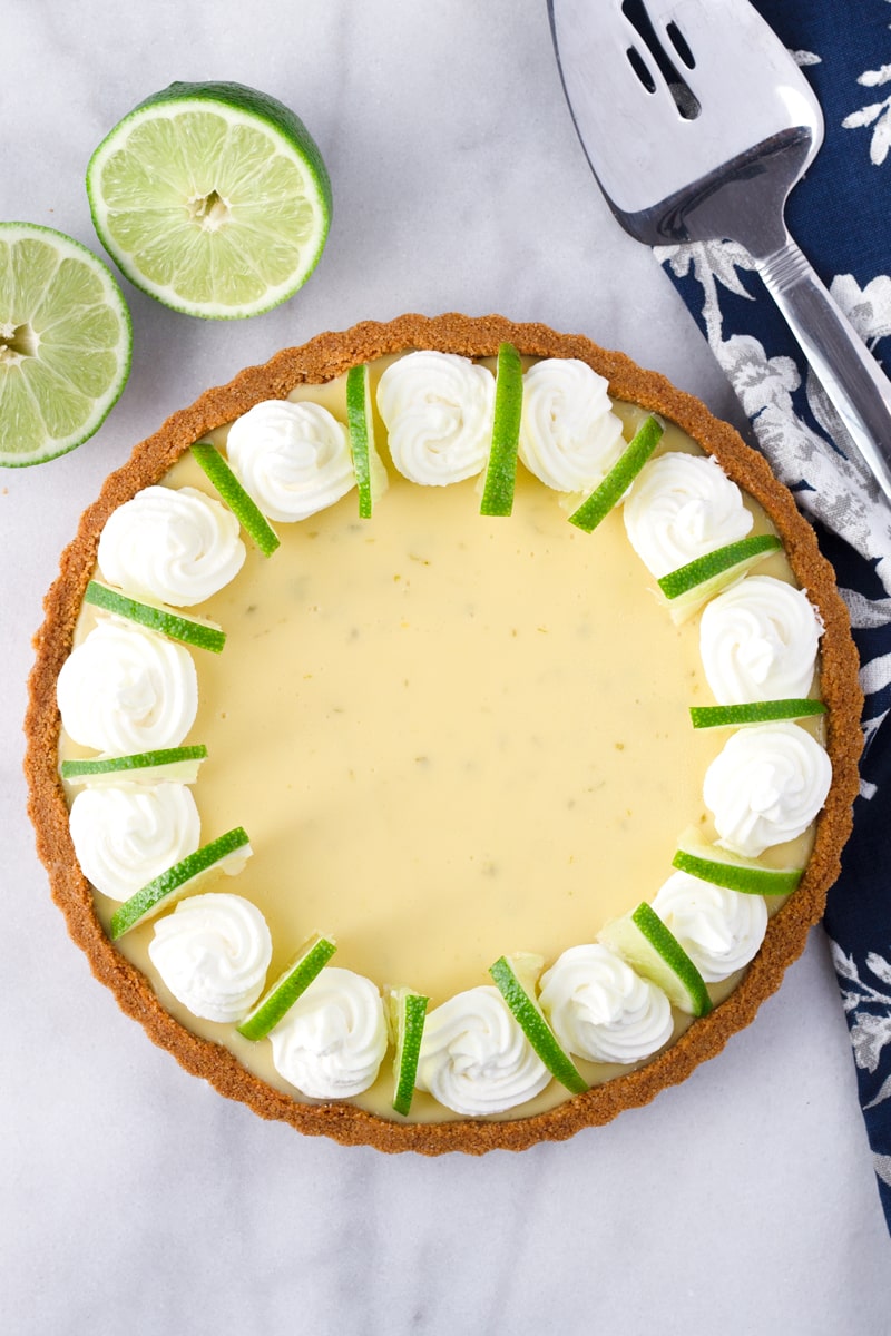 Key Lime Tart with Lime Slices and Whipped Cream