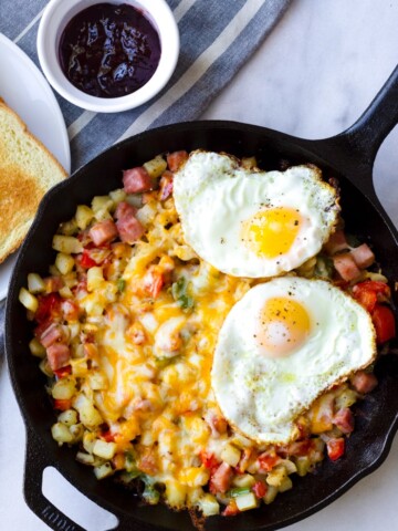 American Potato Breakfast Skillet with Two Fried Eggs