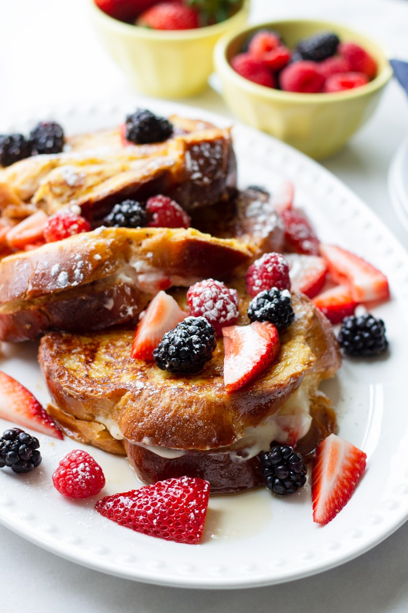 Challah French Toast with Berries in Yellow Bowls