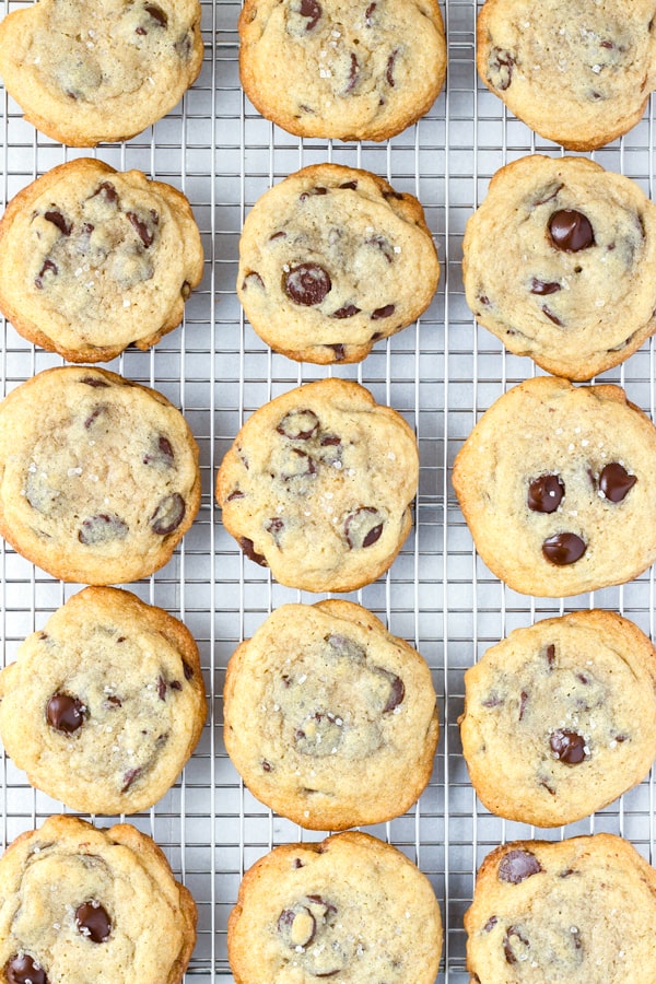 Soft and Chewy Sea Salt Chocolate Chip Cookies Cooling on Rack