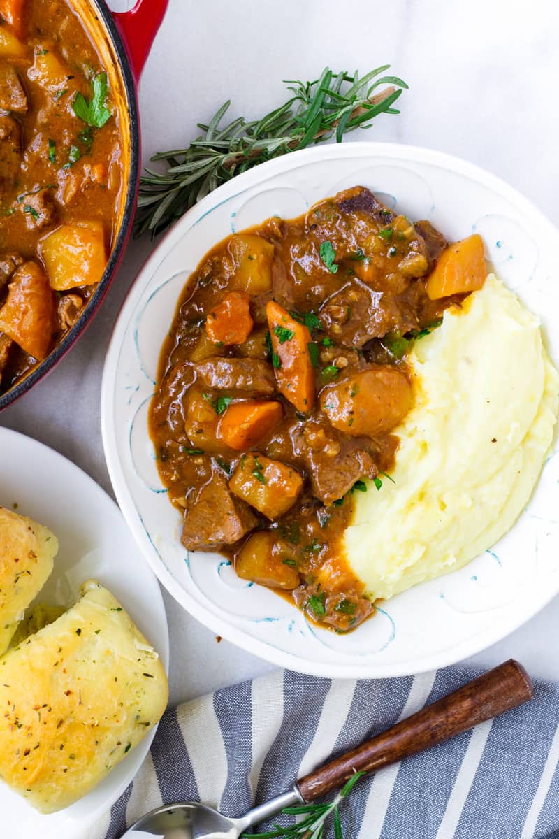 Hearty Beef Stew with Mashed Potatoes and Bread