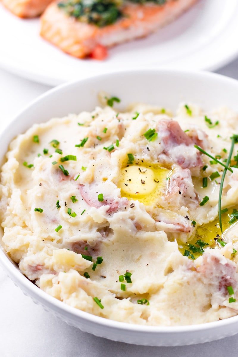 Bowl of mashed potatoes with butter and chives
