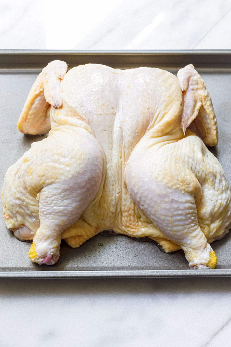 Spatchcocked chicken laying flat