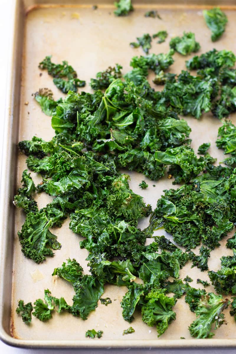 sheet pan with roasted kale leaves