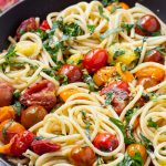 One pan bucatini with blistered fresh tomatoes and basil