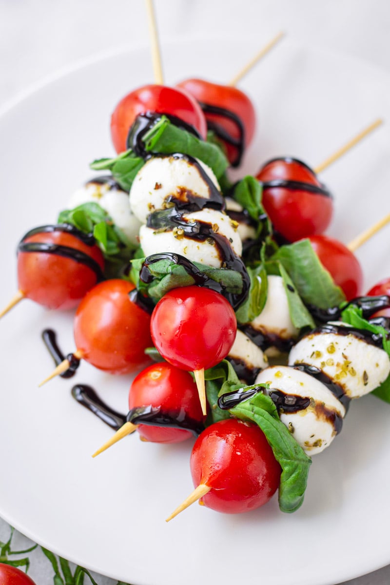 Stacked caprese salad skewers with balsamic glaze
