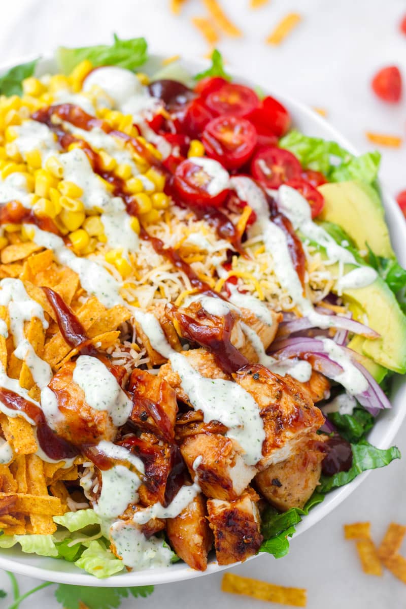 close up of chopped bbq chicken salad with dressing
