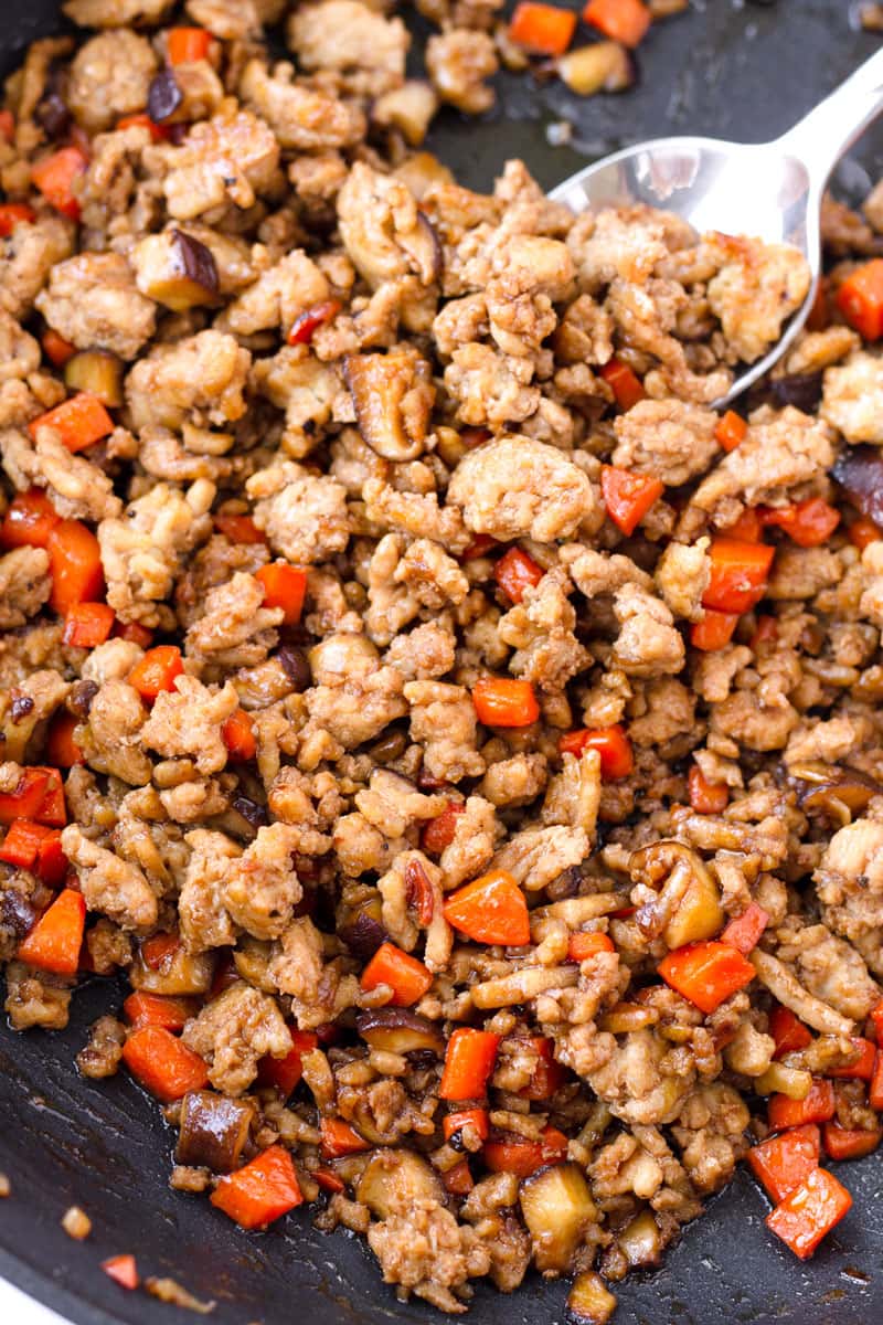 Prepared Asian ground chicken filling with carrots and mushrooms