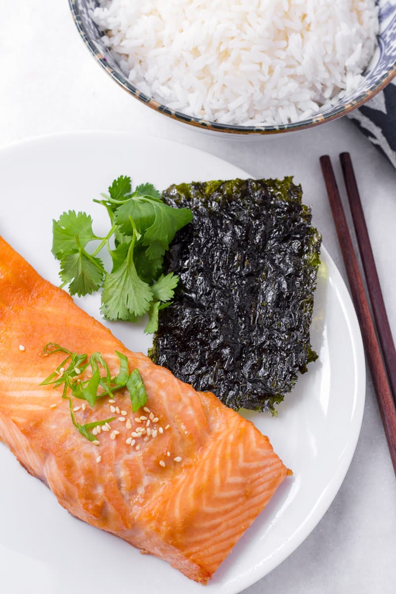 glazed salmon served with nori and white rice