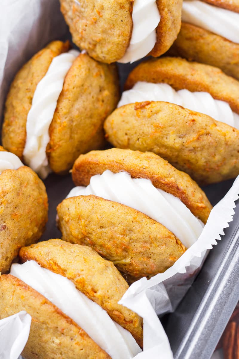 close up of carrot cookies with cream cheese