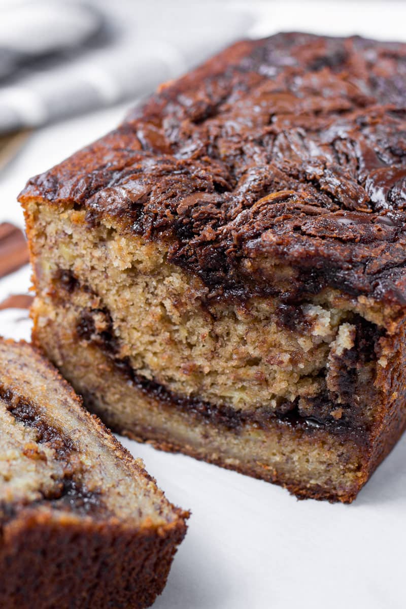 inside of a loaf of banana bread with chocolate hazelnut spread