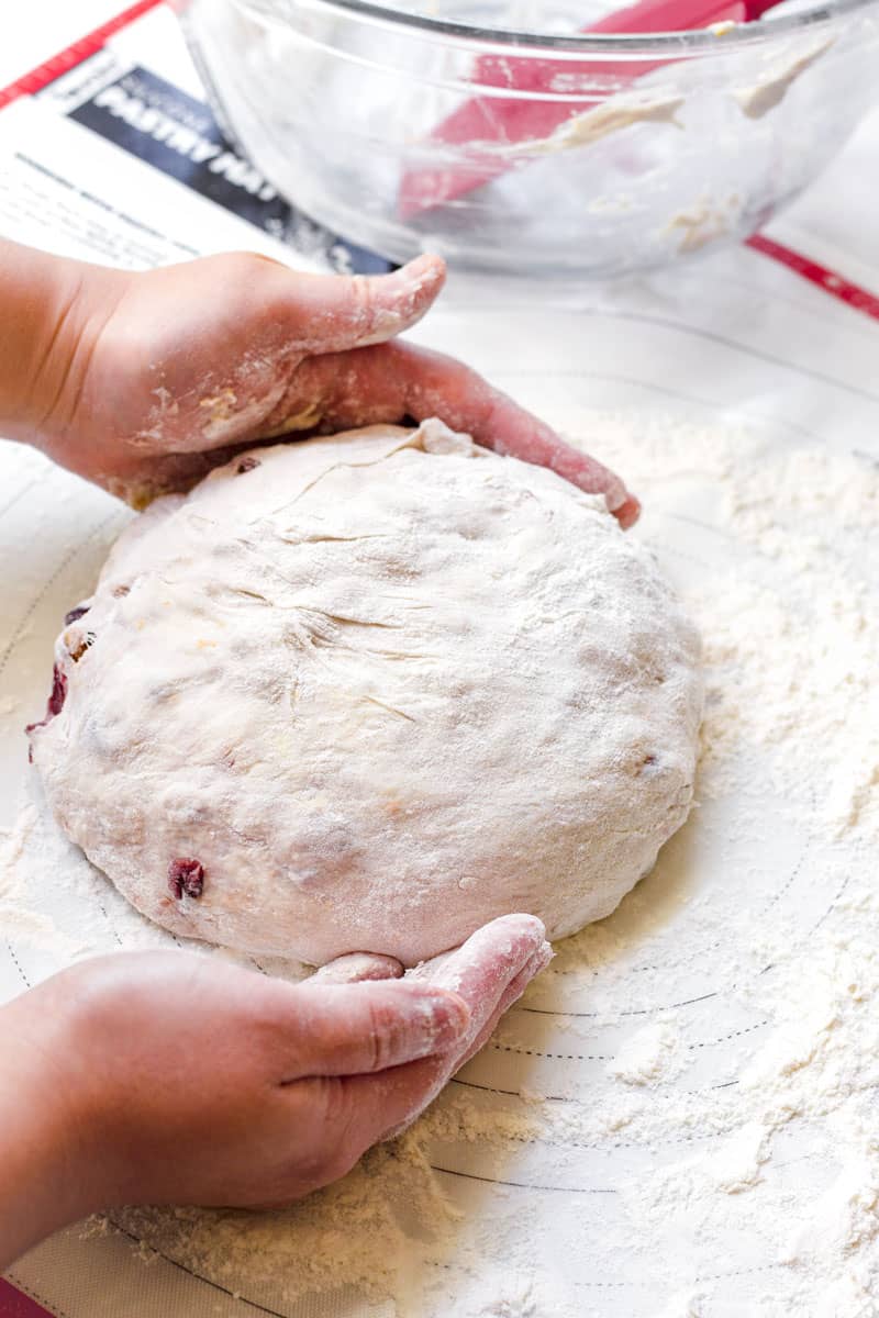 shaping dough into a smooth ball