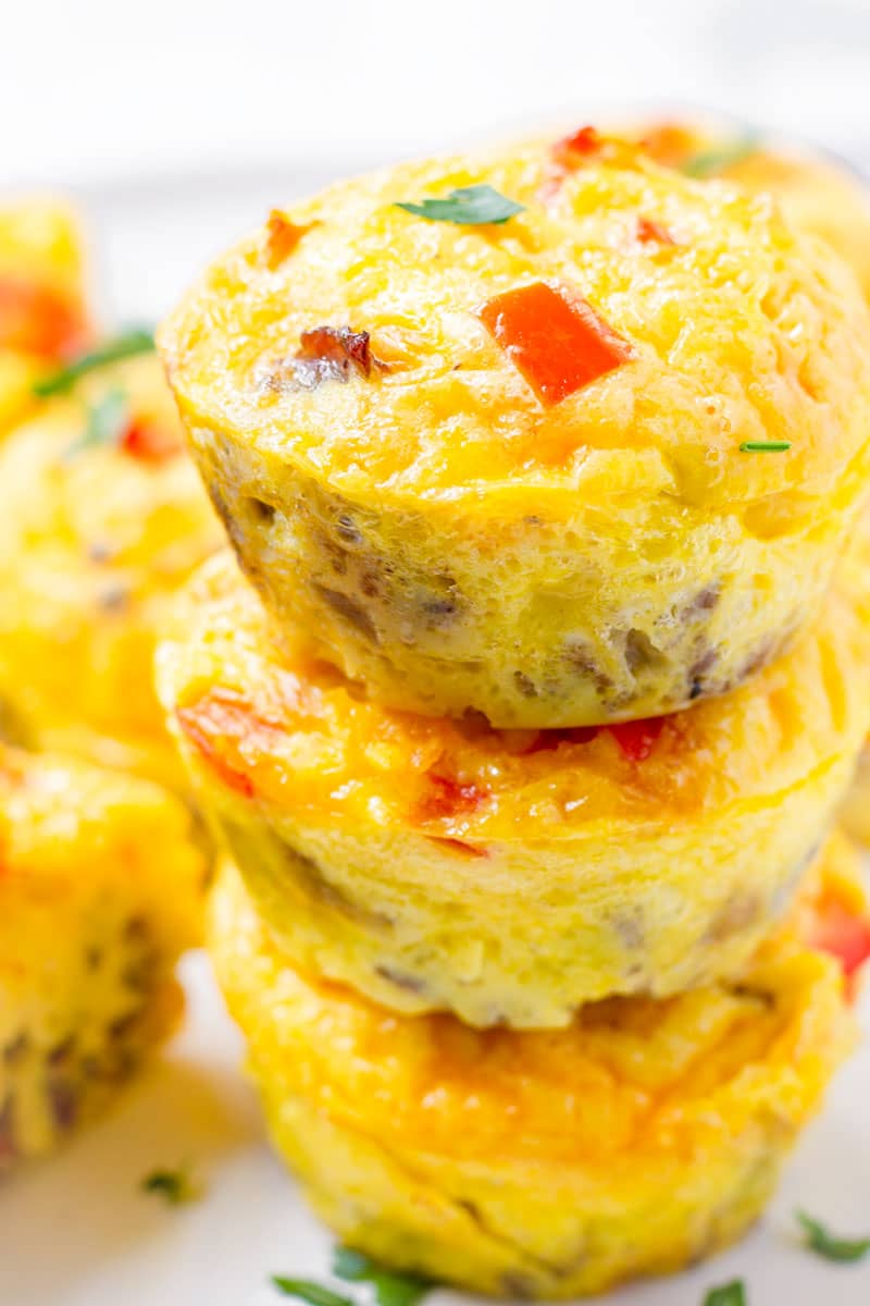 stacked baked egg cups made with peppers and sausage