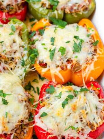 baked ground turkey stuffed peppers with melted mozzarella on top