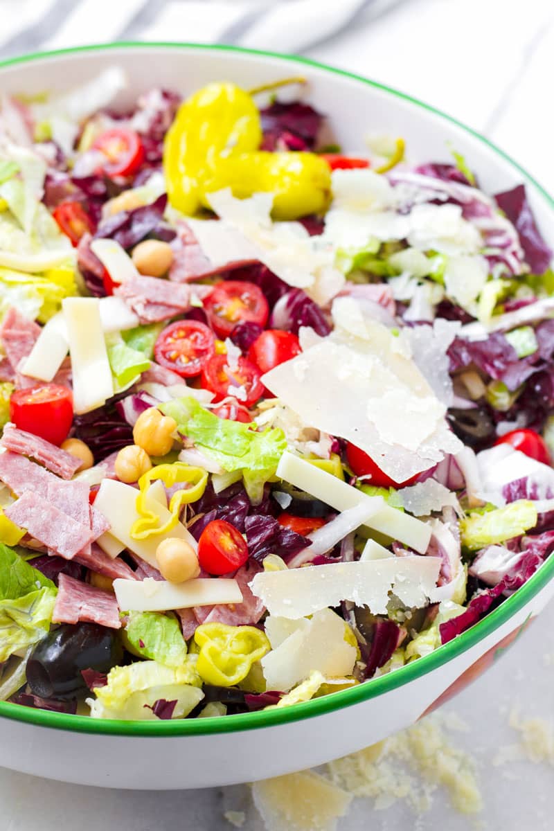 prepared salad with salami, provolone, lettuce, radiccio, olives, and cheese