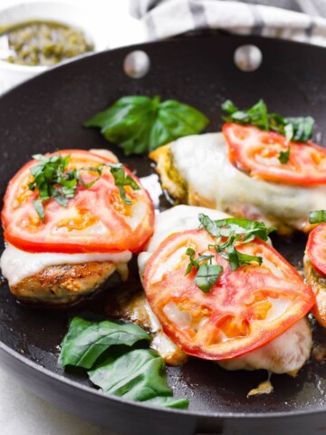 one pan chicken margherita with cheese, tomato, and basil