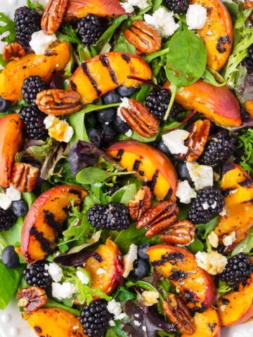 peach salad with fresh fruits and greens