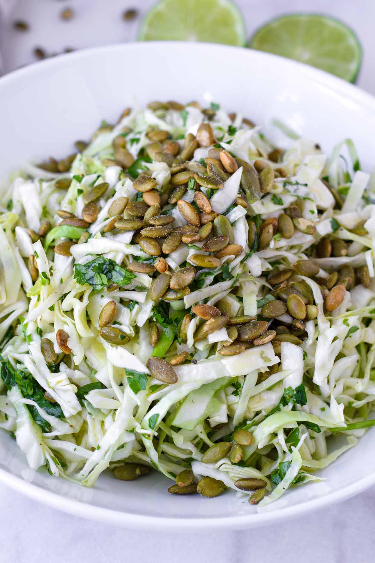 freshly made green cabbage and cilantro salad with pepitas