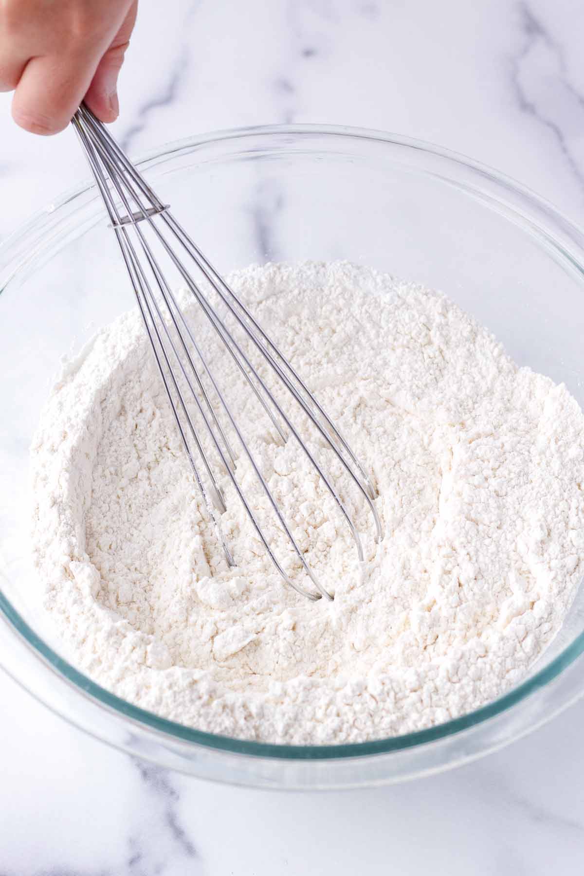 whisking flour, salt, and baking powder