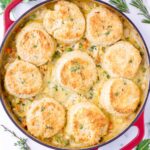 chicken pot pie topped with golden brown biscuits