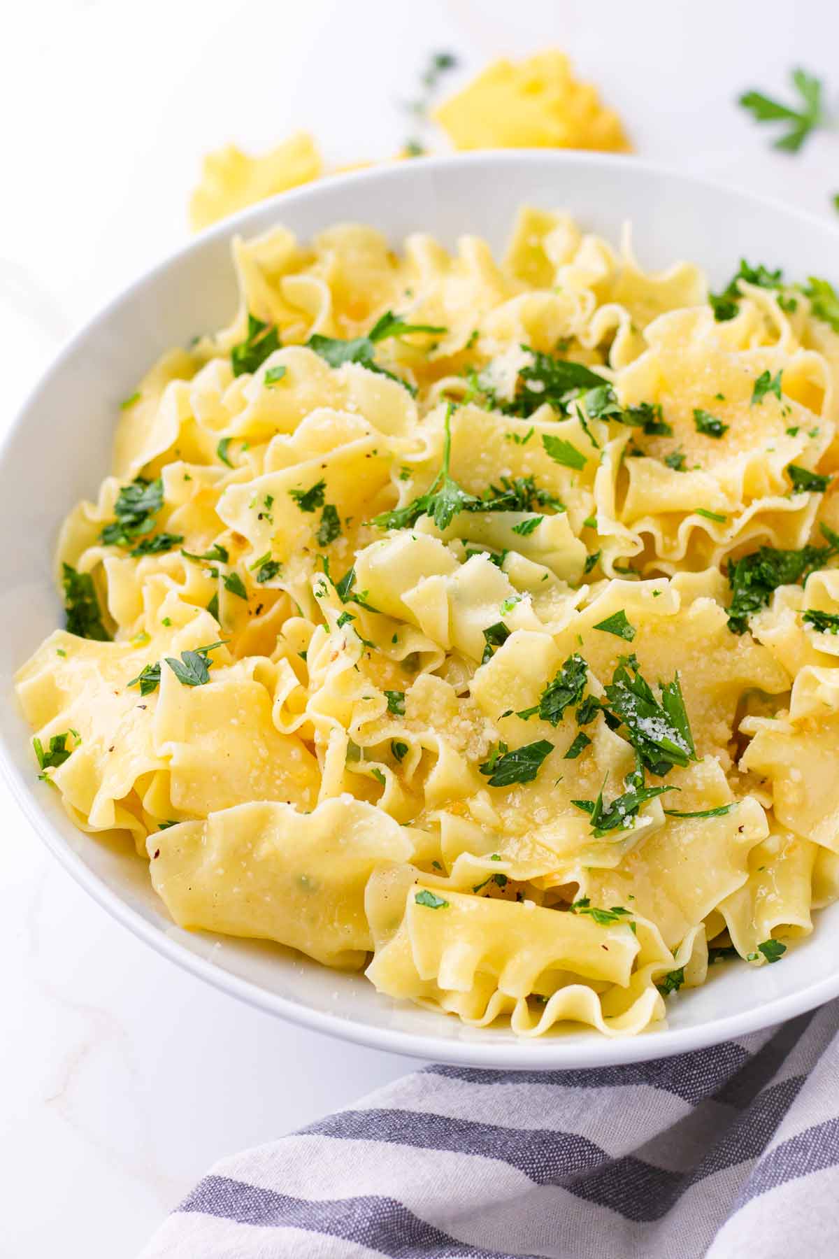 egg noodles cooked with garlic, butter, parmesan, and herbs