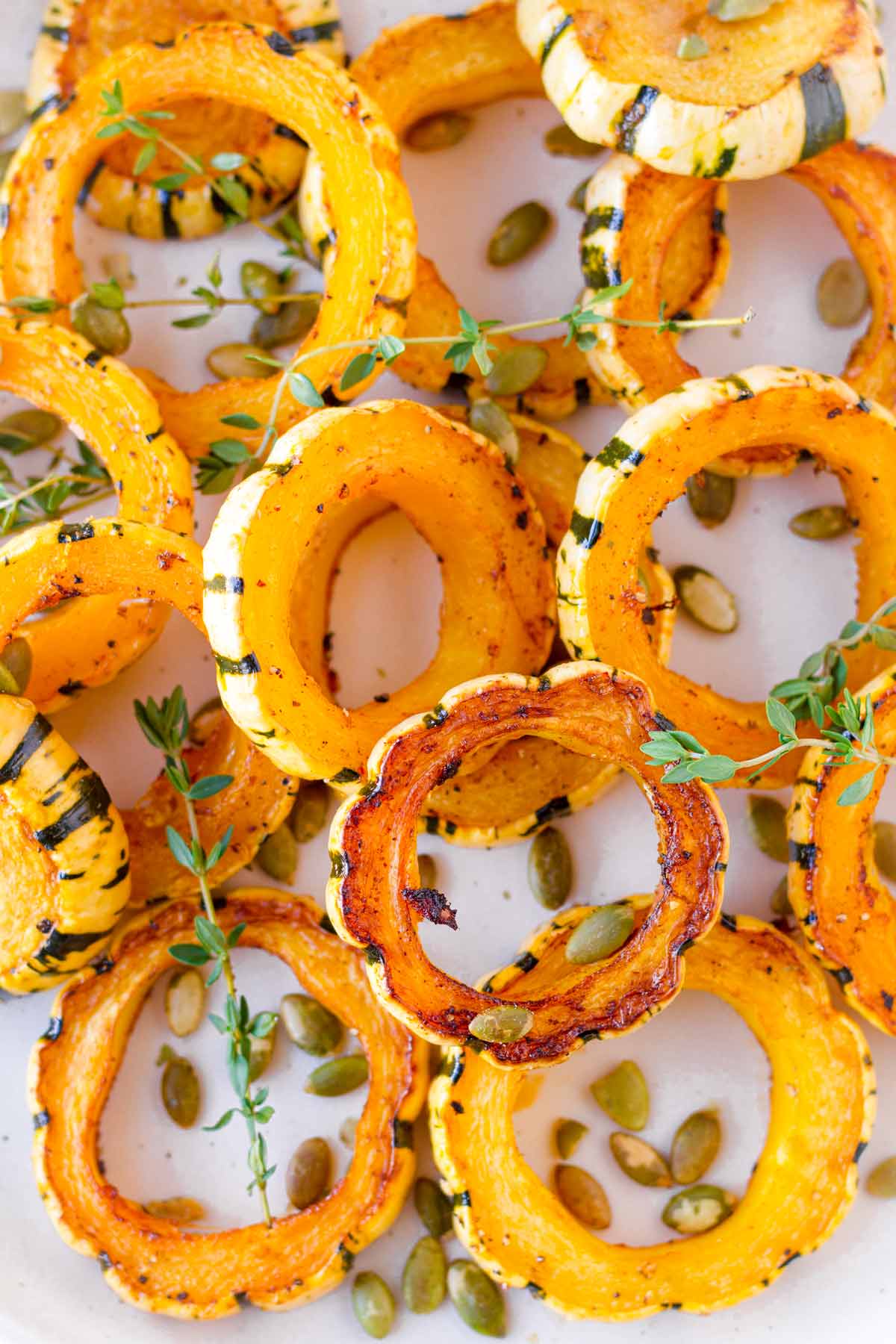 oven roasted squash pieces stacked on top of each other