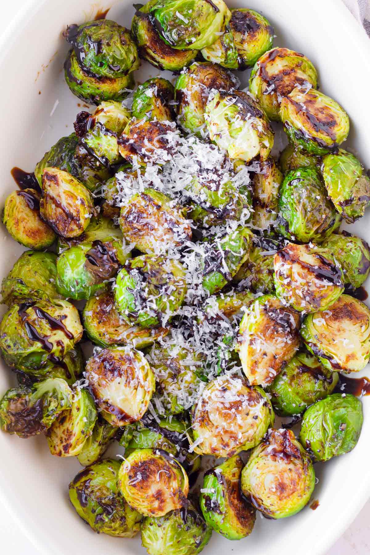 brussels sprouts with balsamic and parmesan cheese garnish