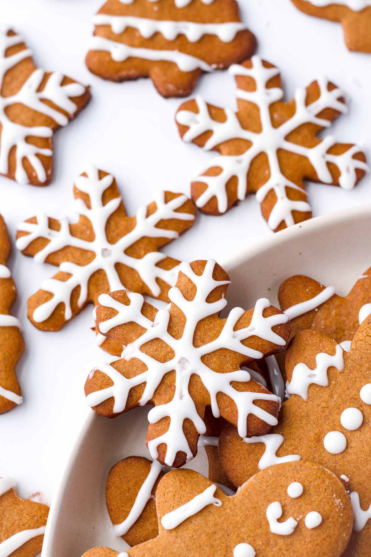 snowflake cutout gingerbread cookies with icing
