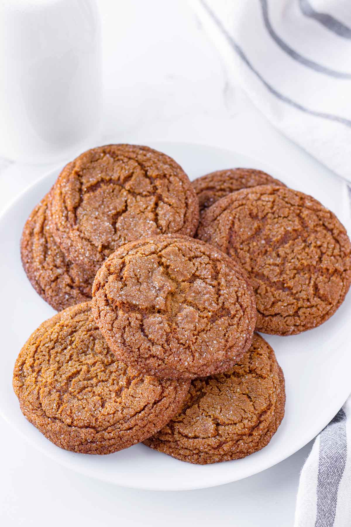 stacked gingersnap cookies on a round plate