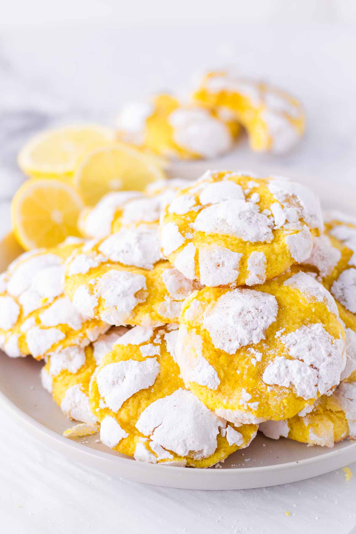 citrus powdered sugar cookies on a plate