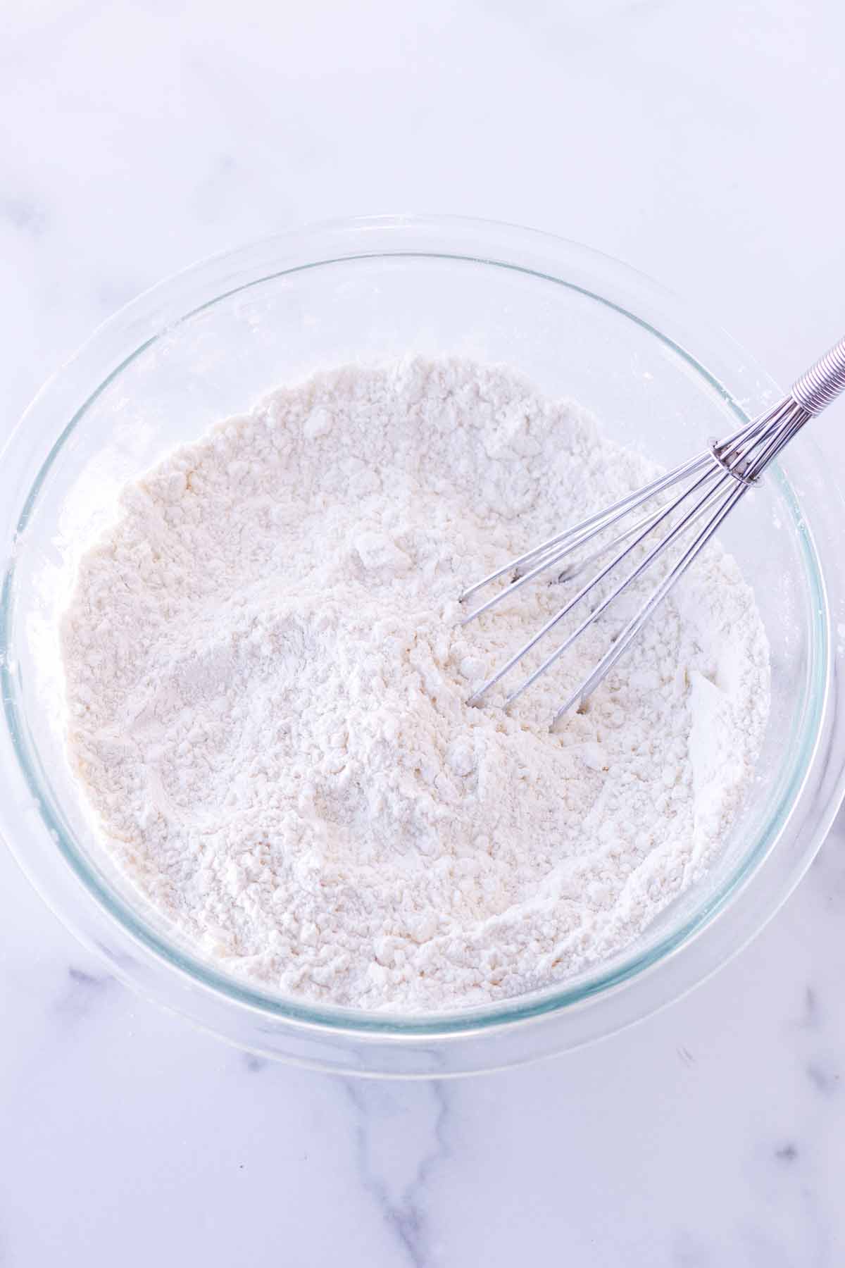 dry ingredients whisked in a glass bowl