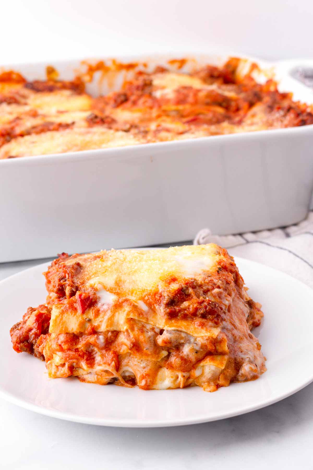a single serving of no boil lasagna bolognese on a plate