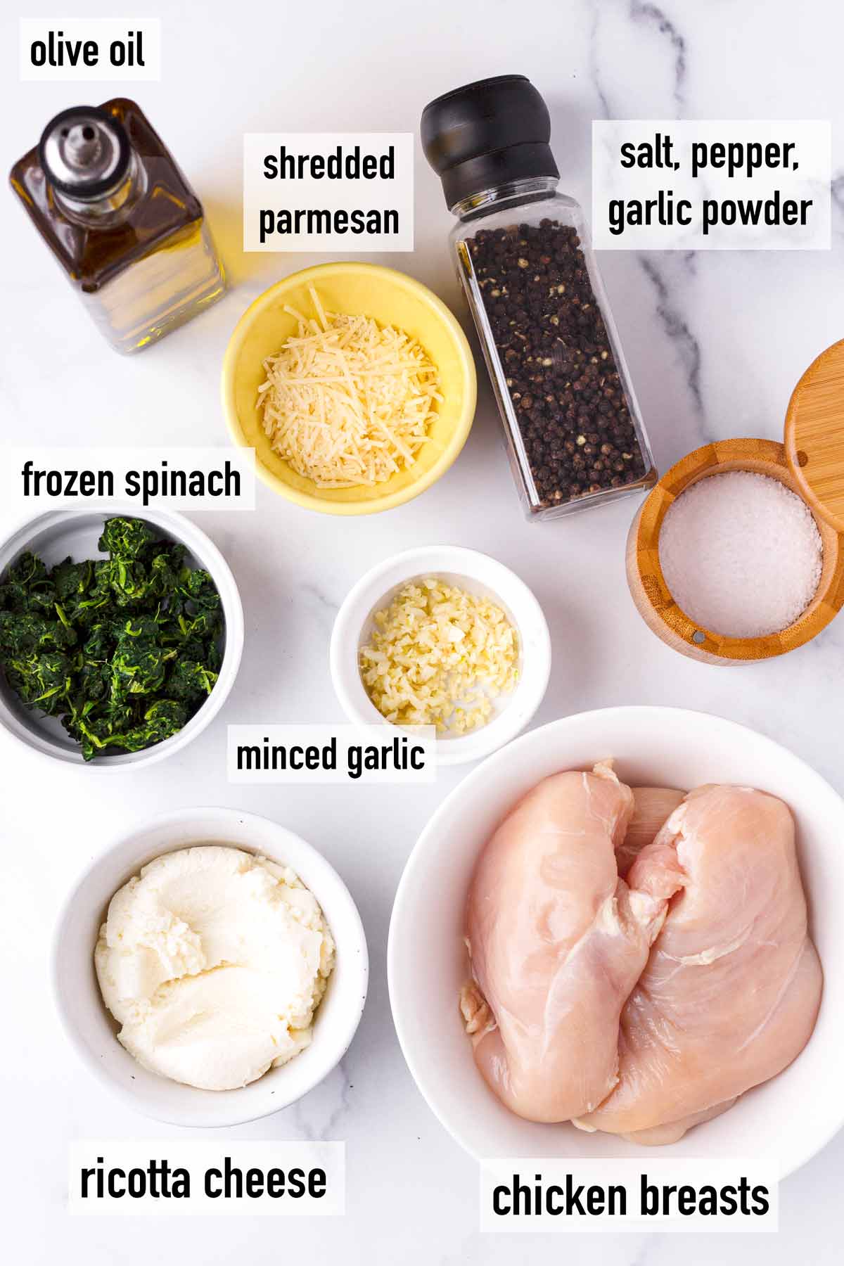 labeled ingredients to make spinach and cheese stuffed chicken