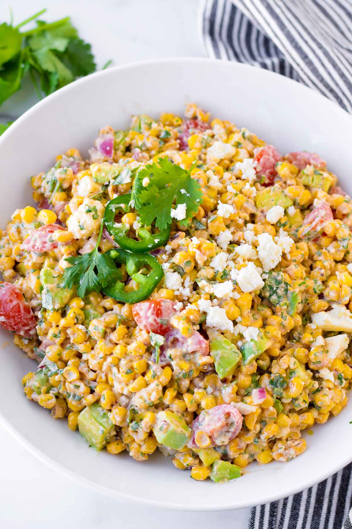 prepared creamy mexican style corn salad with cotija cheese
