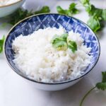 coconut jasmine rice in a blue bowl