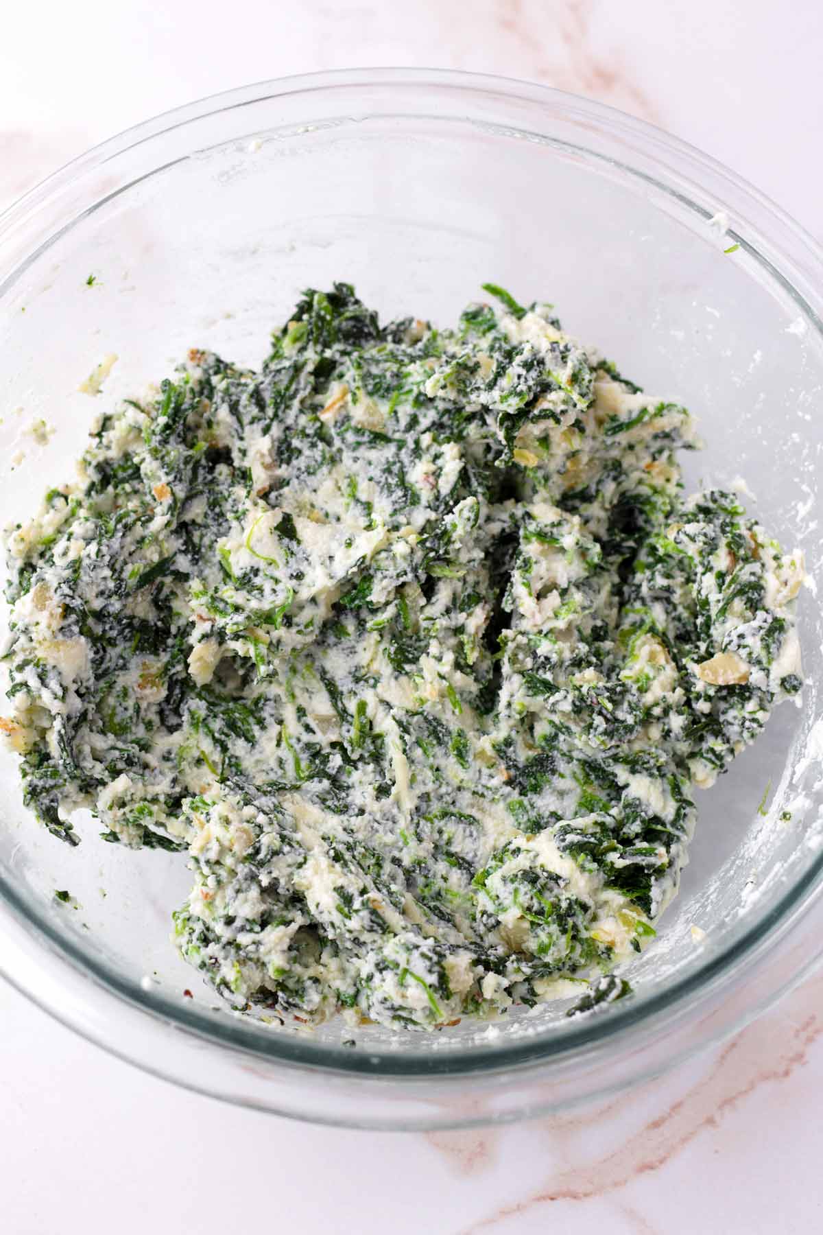 mixed spinach and ricotta in a bowl
