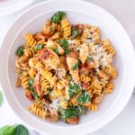 bowl with creamy tuscan chicken pasta