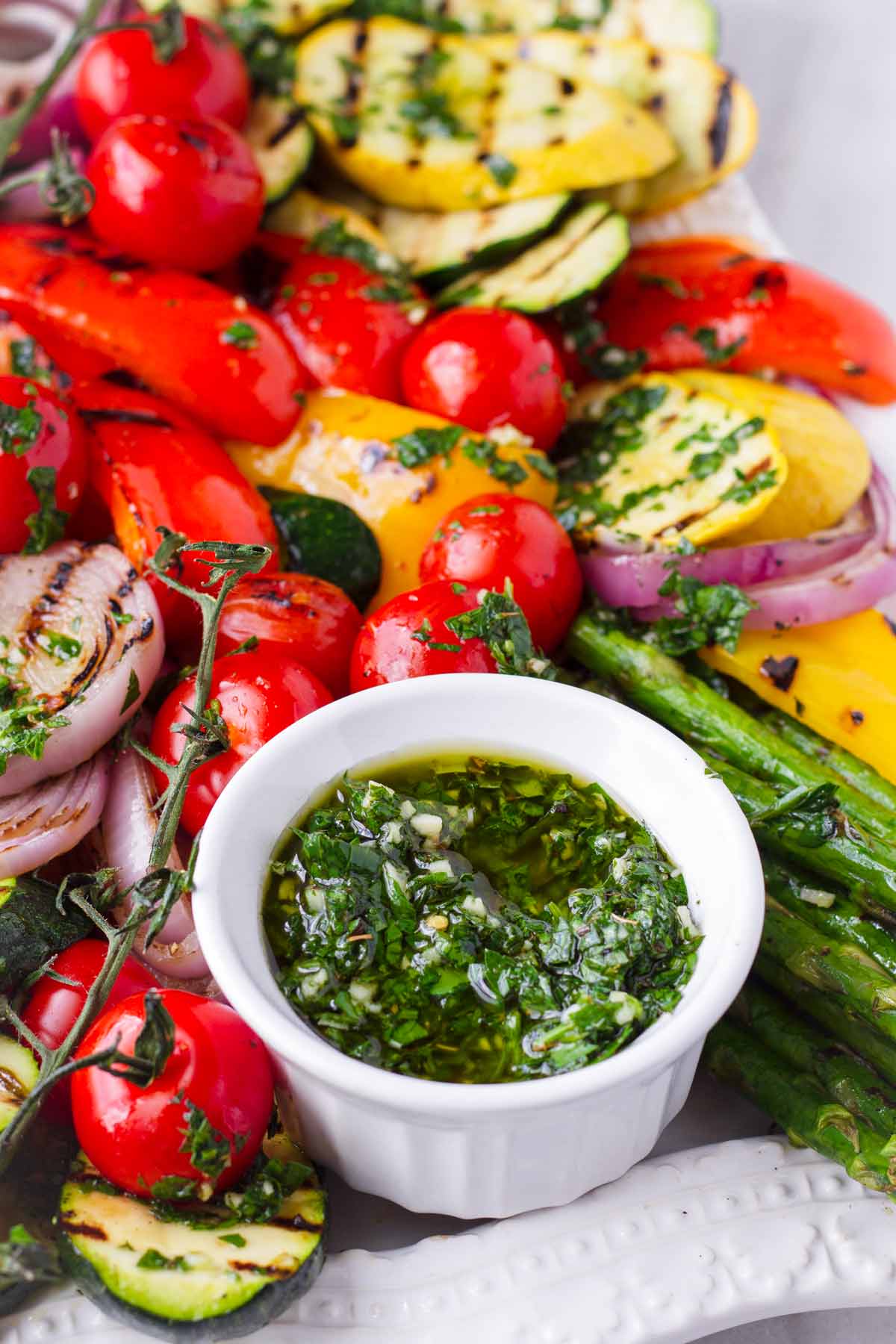 grilled assorted vegetables with a side of chimichurri