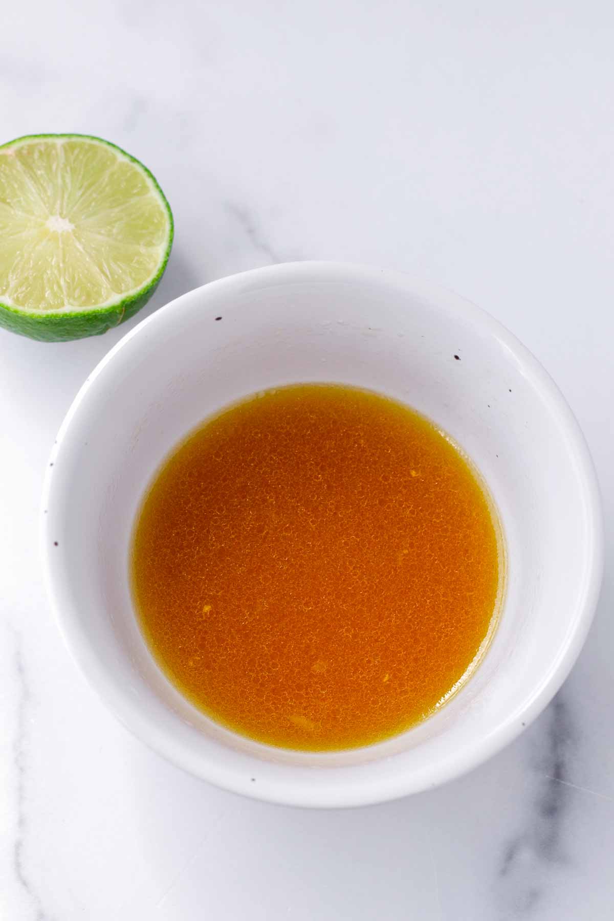 prepared lime honey dressing in bowl