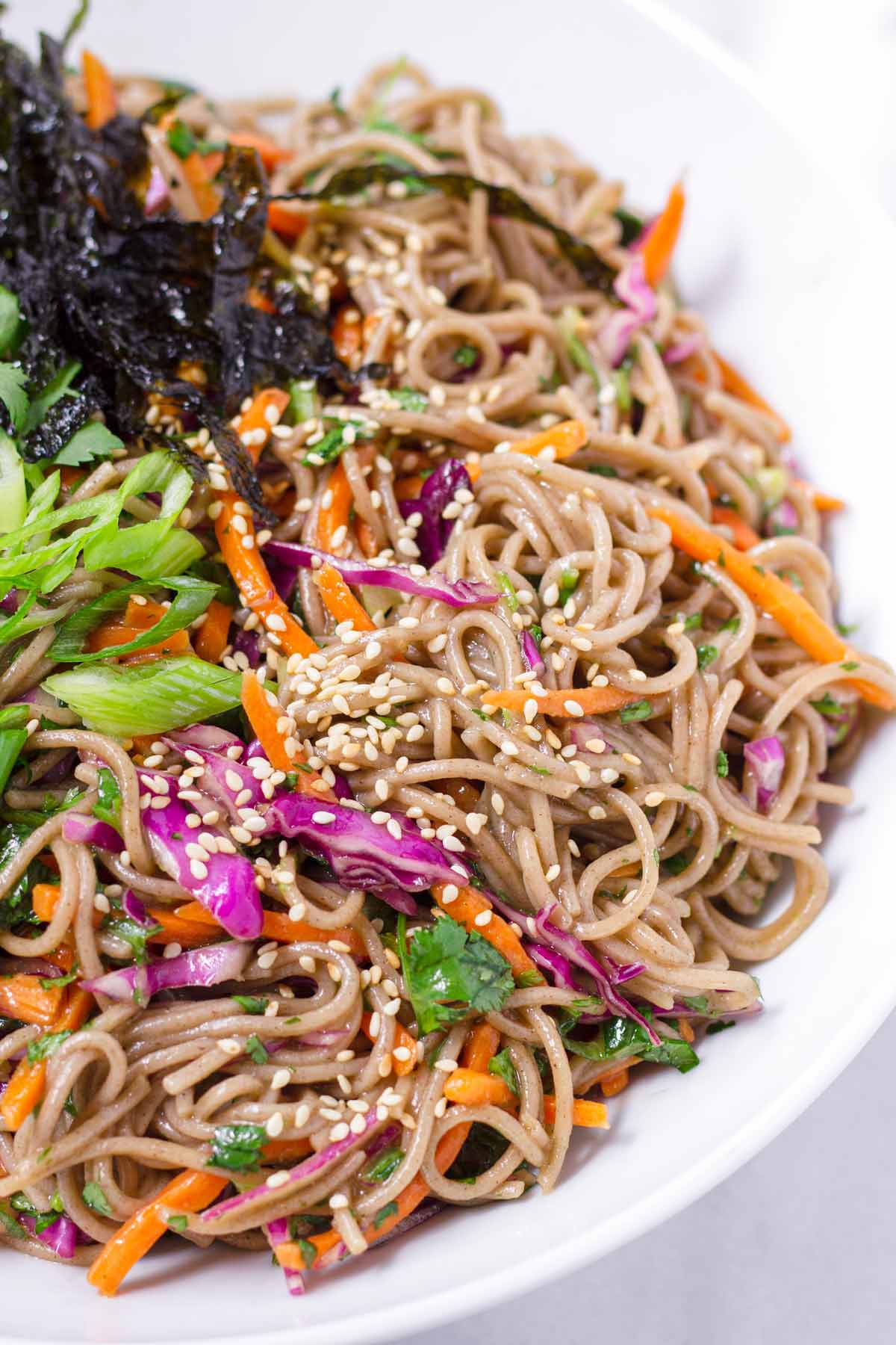 cold soba noodles with dressing, sesame seeds, and veggies