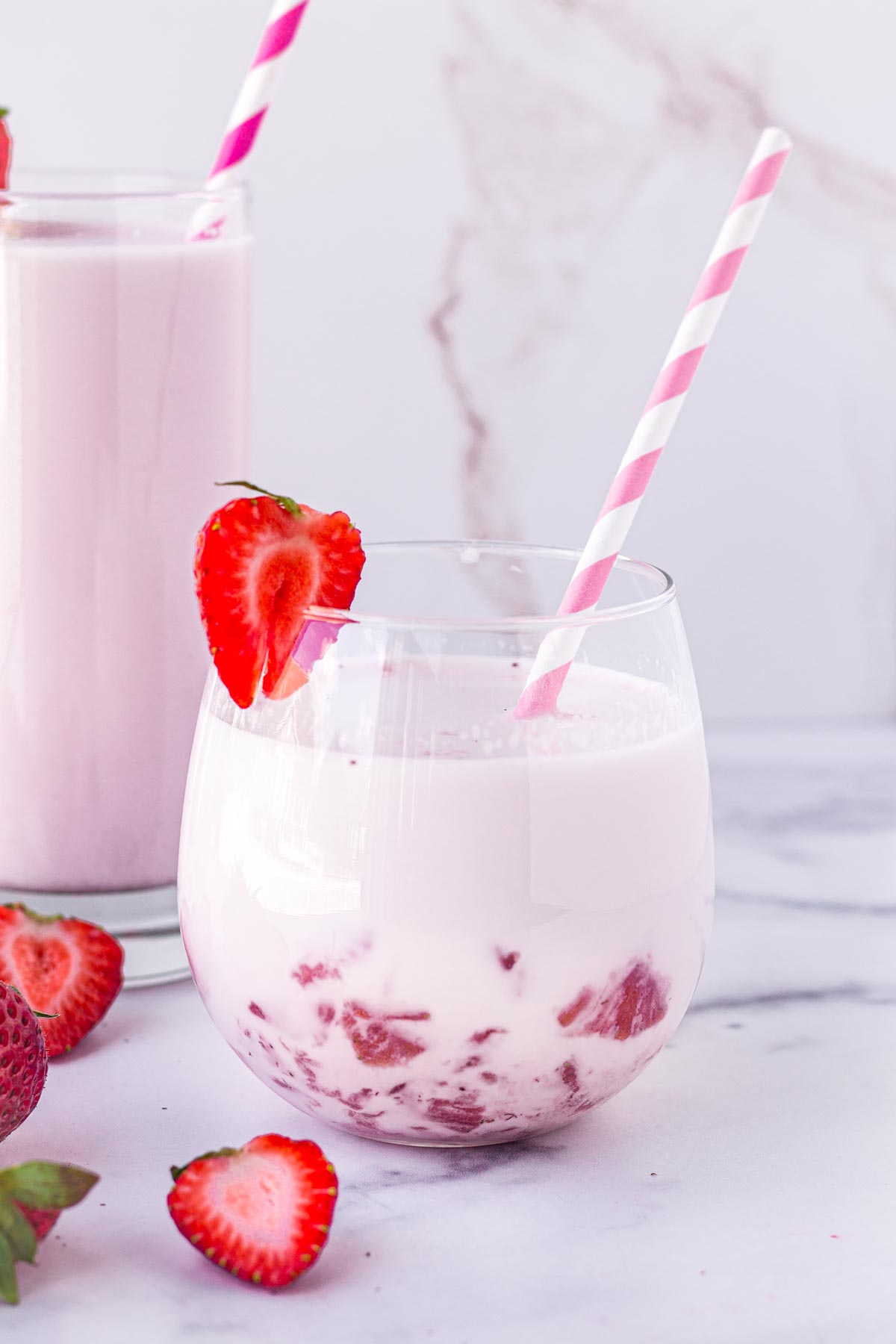 strawberry milk with fresh strawberry puree syrup on bottom